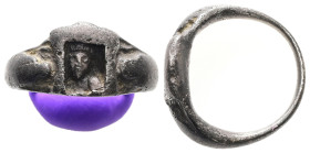 AR Greco-Roman finger-ring (c. AD 1st–3rd centuries)
A silver finger-ring with a niche-shaped bezel; facing bust of a goddess in the niche.
Weight: 7....