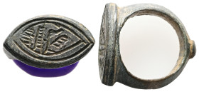 AE Byzantine finger-ring (c. AD 5th–6th centuries)
Bronze finger-ring with raised almond shaped bezel.
Weight: 11.76 g.
Diameter: 18.14 mm.