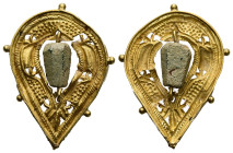 Early Byzantine pendant (c. AD 7th century)
Gold almond-shaped pendant in opus interrasile, embossed and chased with a symmetrical foliate design; in ...