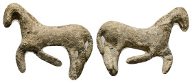 PB Roman statuette of a ram (AD 1st–3rd centuries)
A bronze statuette of a running ram, left.
Weight: 3.34 g.
Diameter: 24.60 mm.
