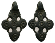 A small bronze decorative cross with hanging loop.
Weight: 2.98 g. 
Diameter: 21.89 mm.