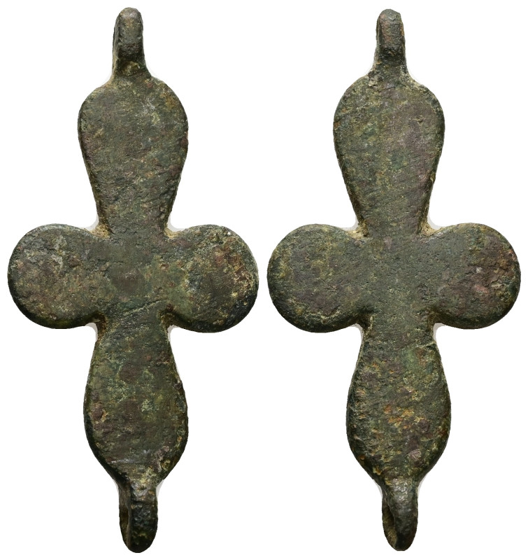 Bronze cross link.
Weight: 10.60 g. 
Diameter: 53.13 mm.