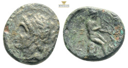 SELEUKID KINGS of SYRIA. Antiochos I Soter. 281-261 BC. Æ . Antioch mint. Diademed head left / Apollo seated left on omphalos, holding bow; P to outer...