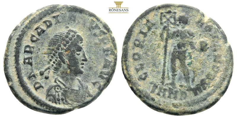 Arcadius. AD 383-408. Æ2
Struck A.D. 383. DN ARCADIVS PF AVG, pearl-diademed, dr...