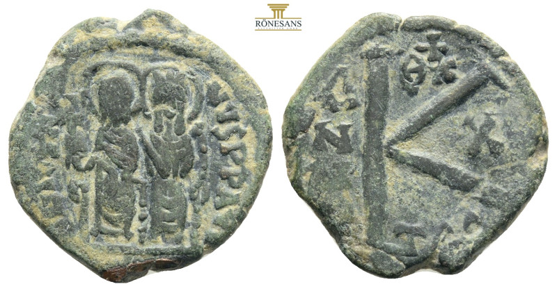 Byzantine
Justin II. 565-578. Æ half follis Thessalonica, 569/570. D N IVSTINVS ...