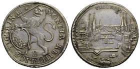 Zürich Stadt / City
 Halbtaler 1734. 33.0 mm. Silber / Silver half thaler. Stadtansicht / city view. Nach links schreitender Löwe mit Wappenschild un...