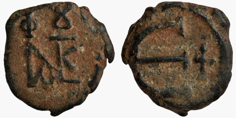 Justin II. (565-578 AD). Æ Pentanummium. Constantinople. Obv: large E. Rev. mono...