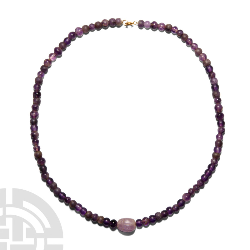 Egyptian Amethyst Bead Necklace with Scaraboid
Middle Kingdom, 2010-1961 B.C. a...