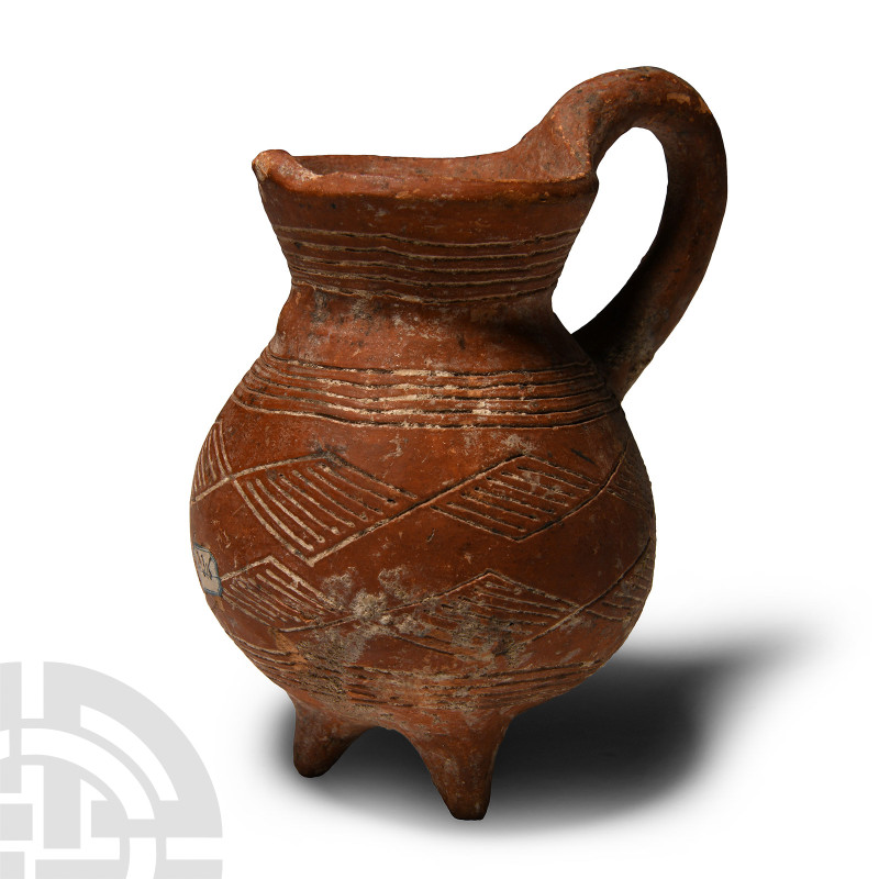Cypriot Terracotta Juglet with Handle
650-600 B.C. With globular body, three st...