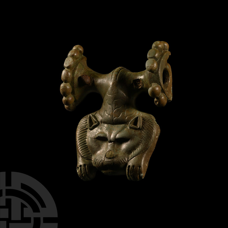 Greek Bronze Handle with Lion-Skin Head
Circa 5th-4th century B.C. Formed as th...