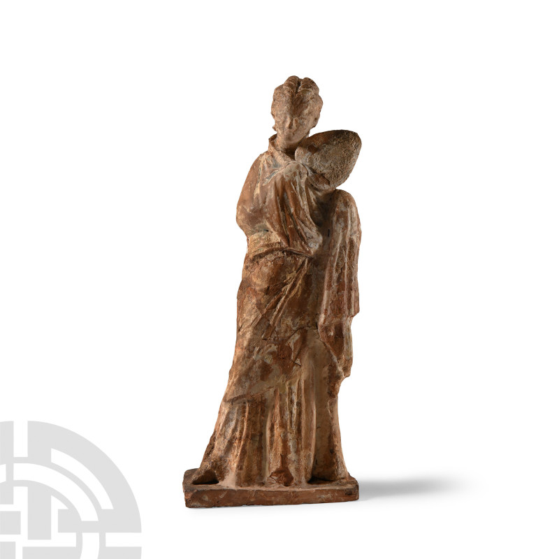 Greek Tanagra Female Figure with Fan
4th-3rd century B.C. Modelled robed with a...