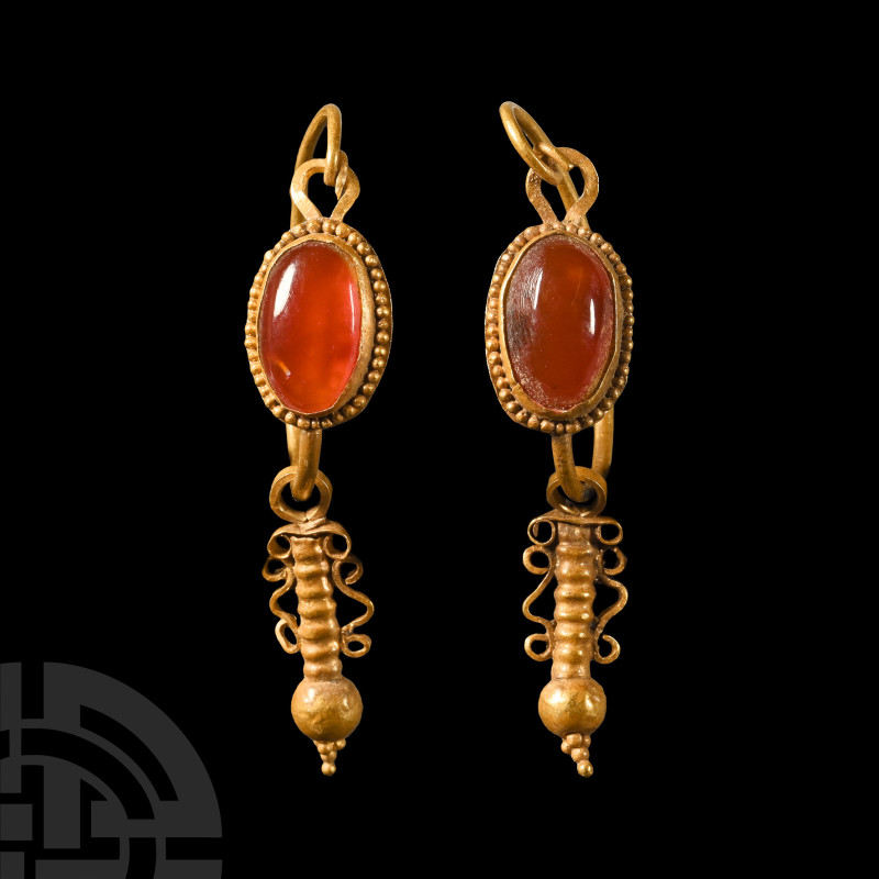 Hellenistic Gold Earrings with Gemstones
Circa 2nd-1st century B.C. Matched pai...