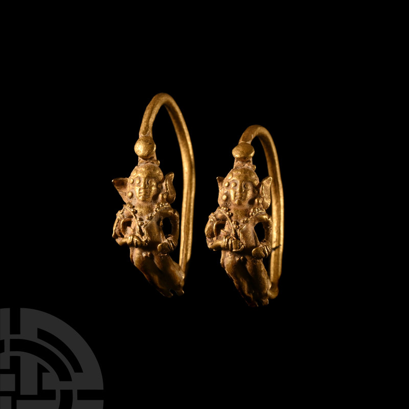 Hellenistic Gold Eros Earrings
Circa 2nd-1st century B.C. Each formed as a roun...