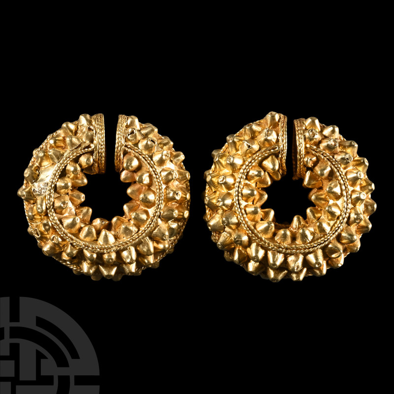 Etruscan Gold Leech Earring Pair
3rd century B.C. or later. Formed as hollow pe...