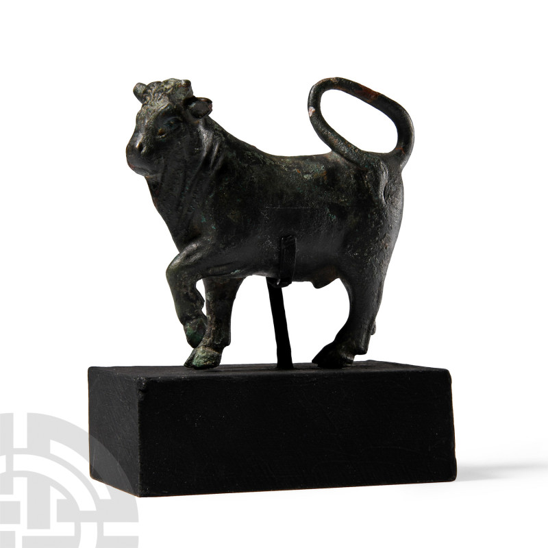 Roman Apis Bull Statuette
Circa 2nd century A.D. Standing with its left foreleg...