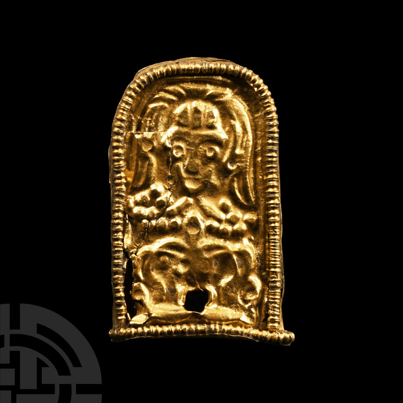 Byzantine Gold Strap End with Facing Figure
Circa 9th-10th century A.D. The hol...