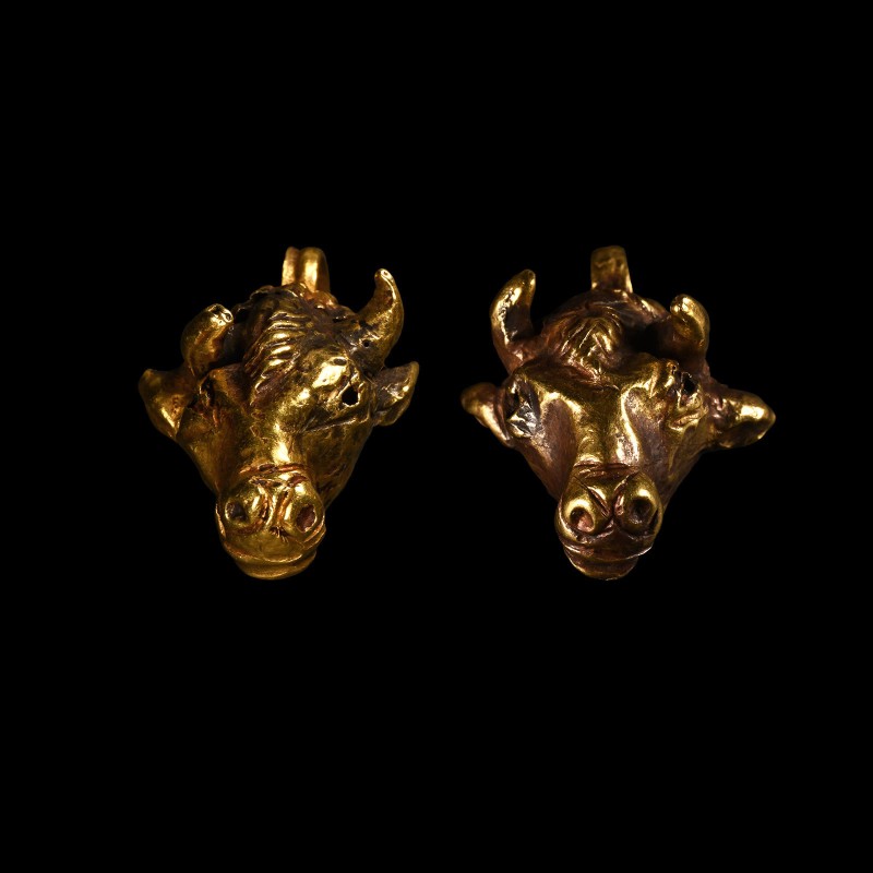 Western Asiatic Gold Bull-Headed Pendants
7th-6th century B.C. Matched pair of ...