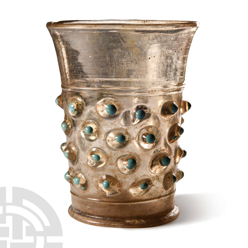 Medieval Glass Beaker with Prunts
13th-15th century A.D. Of tubular form with f...