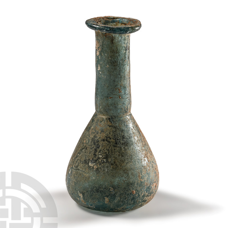 Roman Blue-Green Glass Ampulla
1st-2nd century A.D. Slightly concave base, a pi...