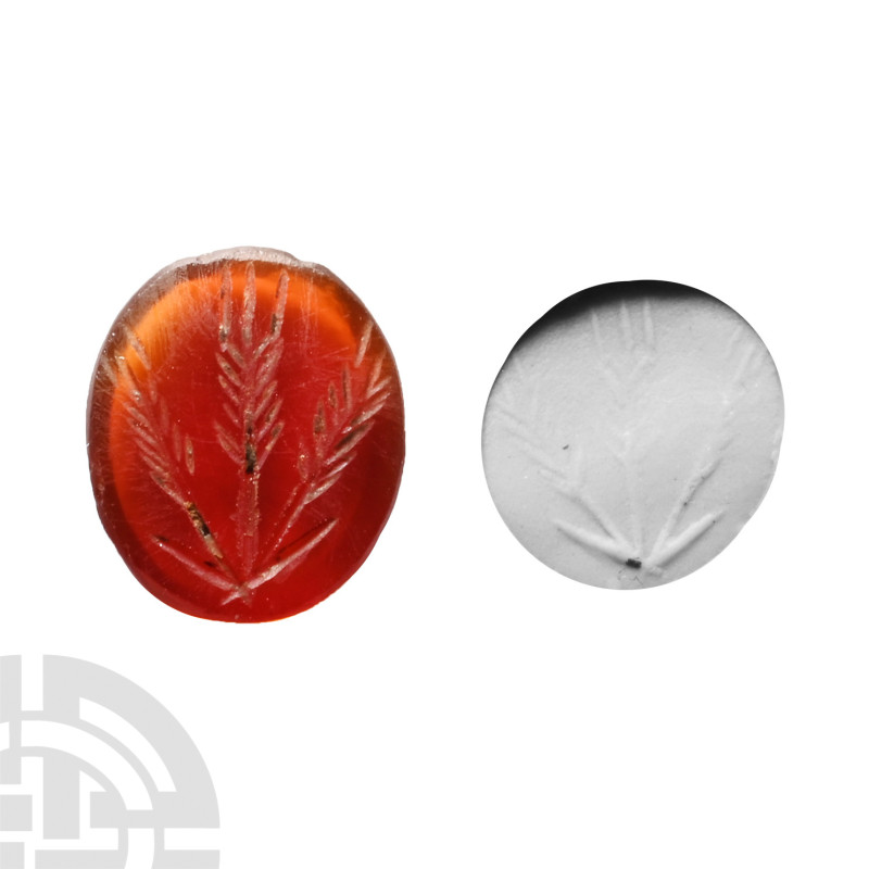 Roman Intaglio Gemstone with Wheat
Circa 2nd-3rd century A.D. Carnelian with in...