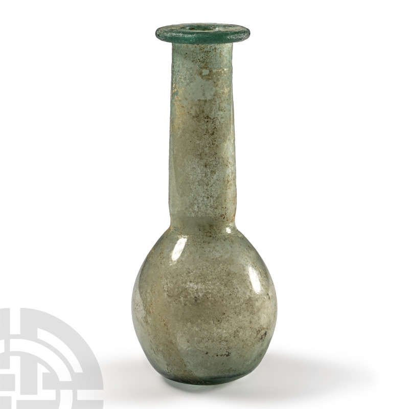 Roman Tall Pale Blue Glass Vial
3rd century A.D. Bulbous with flat base, tall s...