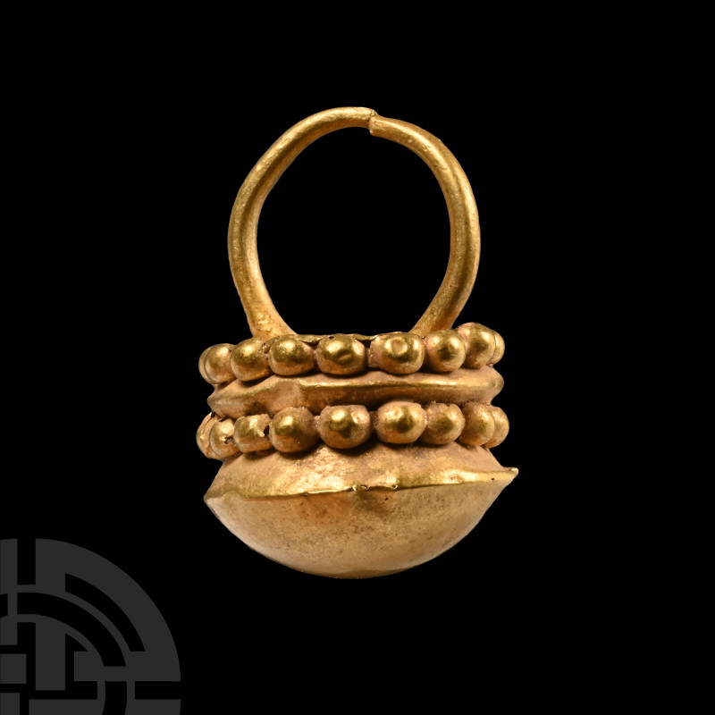 Byzantine Gold Earring
Circa 8th-12th century A.D. Hollow-formed drum with dome...