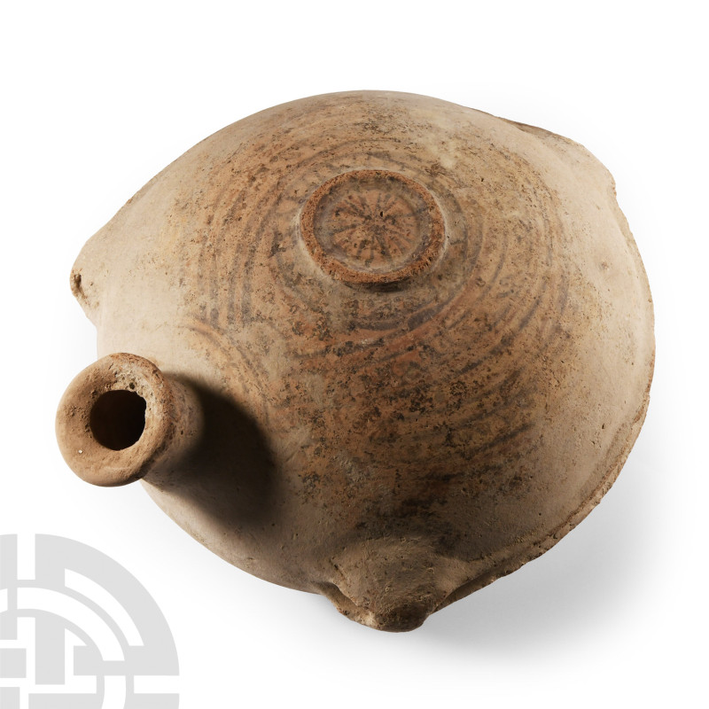 Western Asiatic Terracotta Flask with Star Design
1st millennium B.C. Of lentoi...