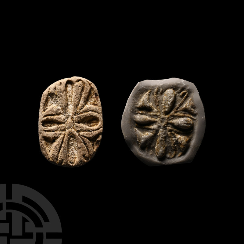 Sumerian Seal with Lotus Flower
Circa 3rd millennium B.C. White glazed composit...