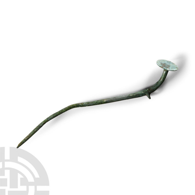 Bronze Age British Flat-Topped Cloak Pin
1500-900 B.C. With curved shank, broad...
