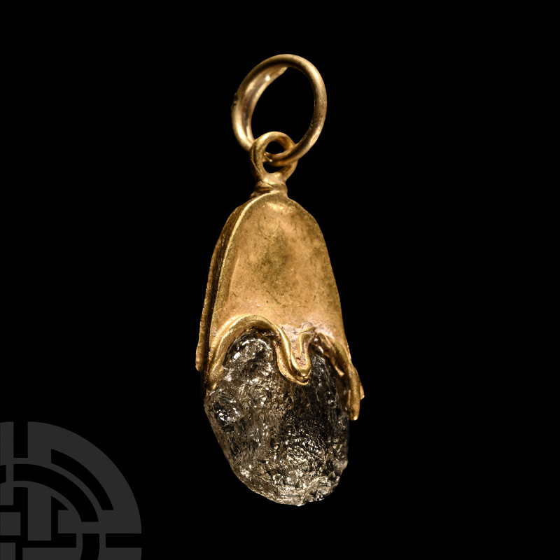 Viking Age Gold 'Elf Shot' Pendant
9th-10th century A.D. or earlier. Formed as ...