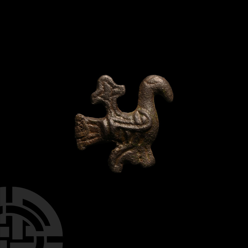 Viking Bronze Bird Brooch with Cross
10th century A.D. The bird in profile with...