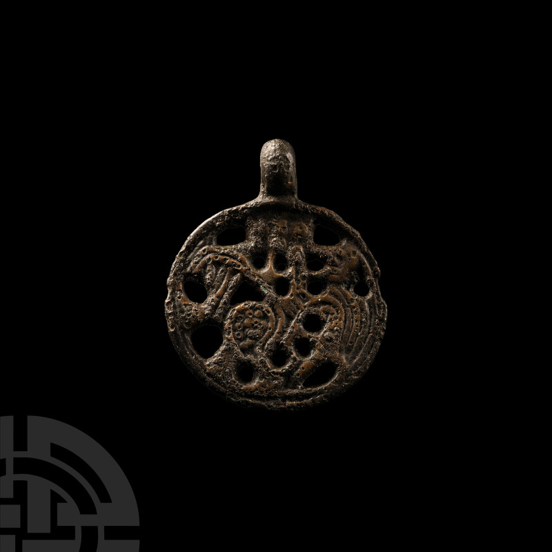 Viking Age Bronze Beast Pendant
10th-11th century A.D. Composed of an discoid b...