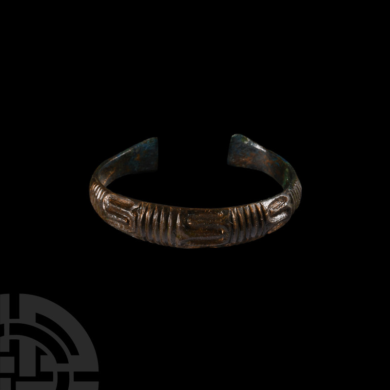 Viking Age Bronze Decorated Bracelet
9th-11th century A.D. Of penannular form, ...