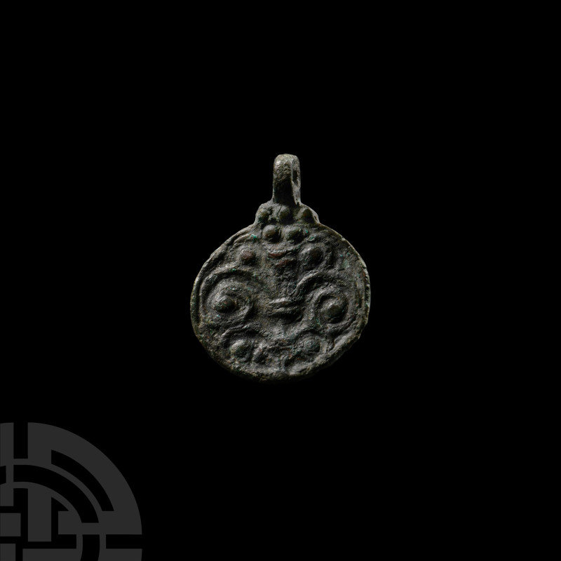 Viking Age Bronze Pendant
9th-11th century A.D. Of discoid form with integral s...