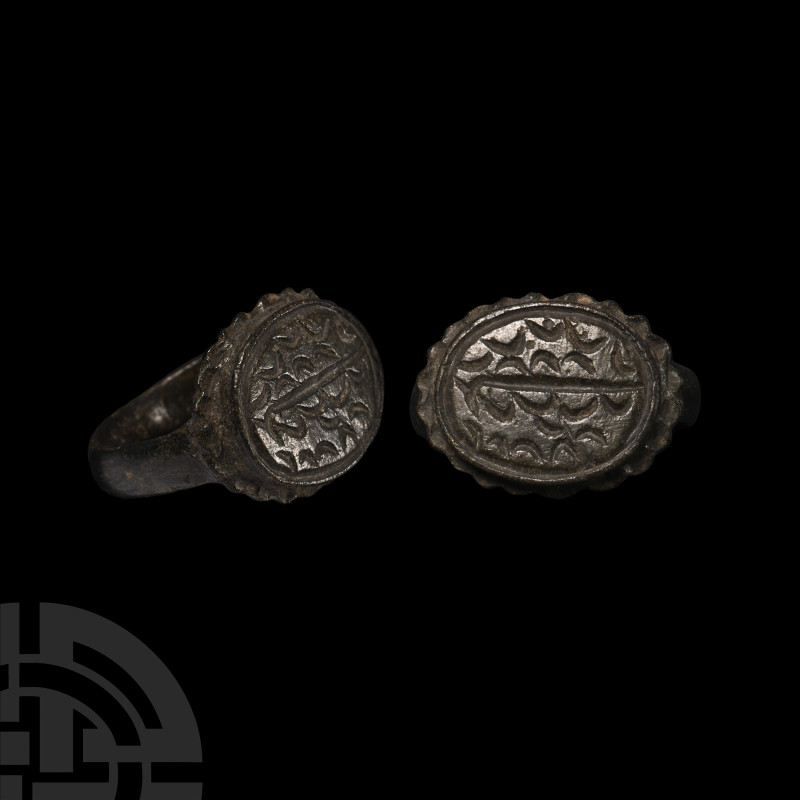 Medieval Bronze Ring with Wave Motif
15th-16th century A.D. D-section hoop, ell...