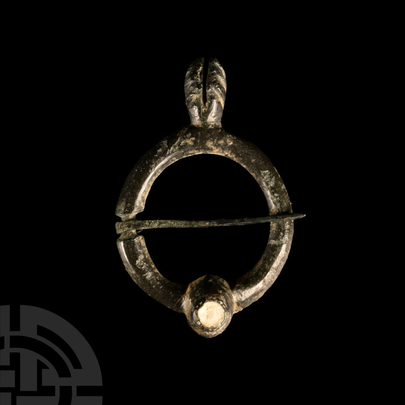 Medieval Bronze Annular Brooch with Turret
Circa 13th-14th century A.D. White e...