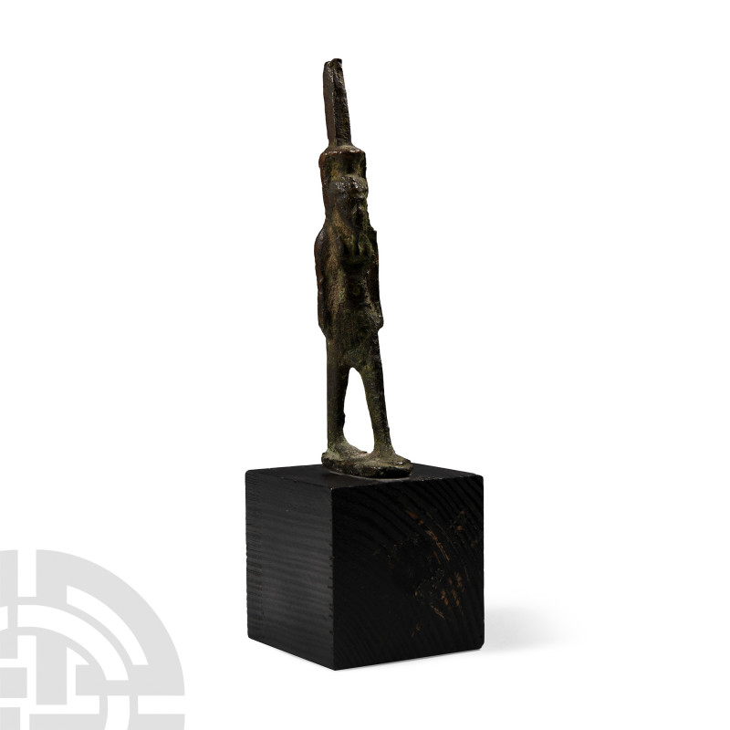 Egyptian Style Bronze Figure of Nefertem
20th century A.D. Striding and wearing...