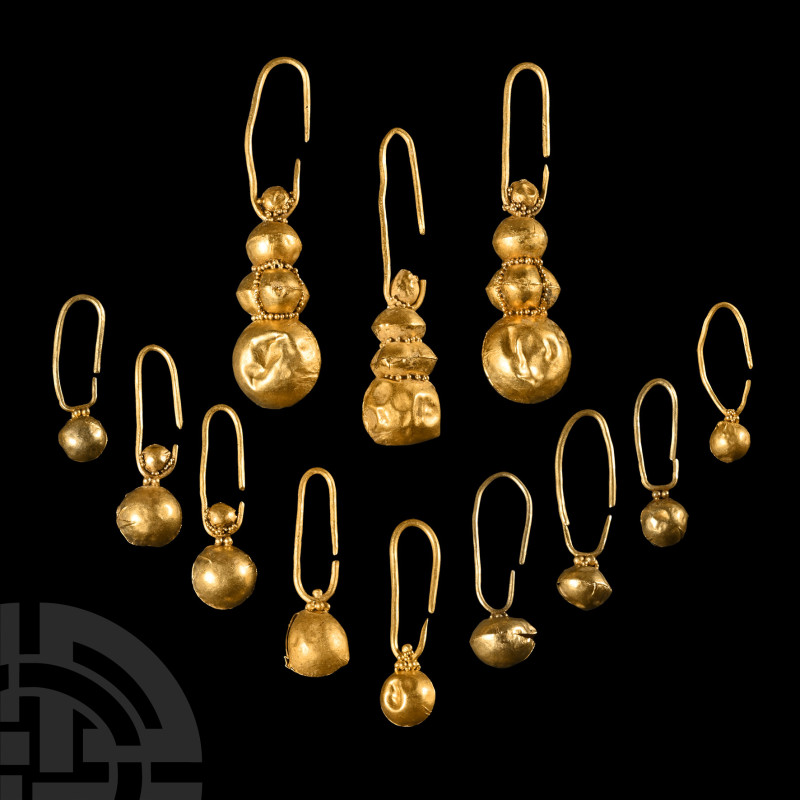 Viking Style Gold Earring Group
20th century A.D. or earlier. Comprising earrin...