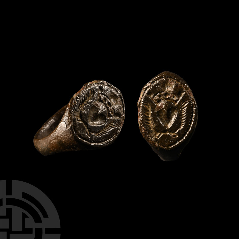 Tudor Period Bronze Signet Ring with Crowned Heart
17th century A.D. With a D-s...