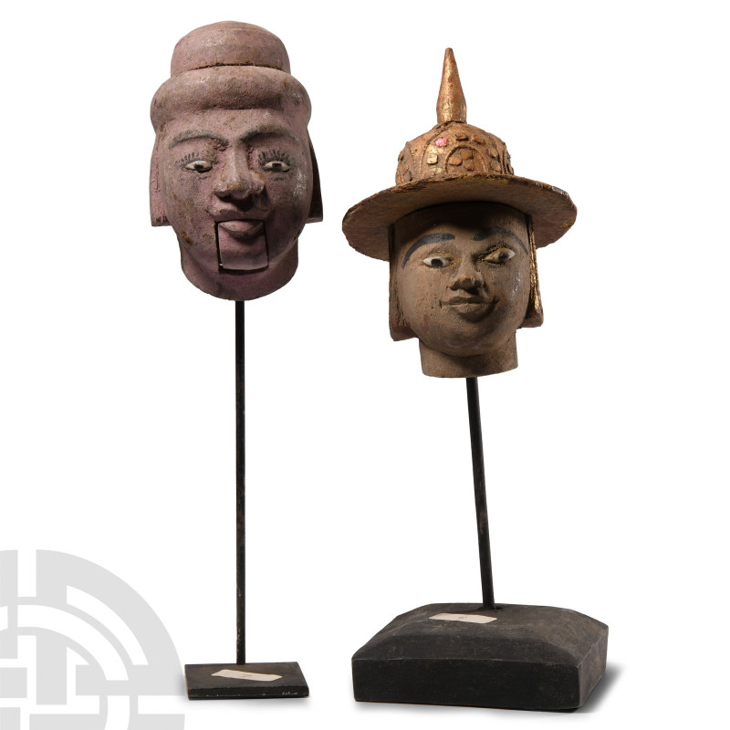 Puppet and Statue Head Group
Circa 17th-18th century A.D. Two wooden figure hea...