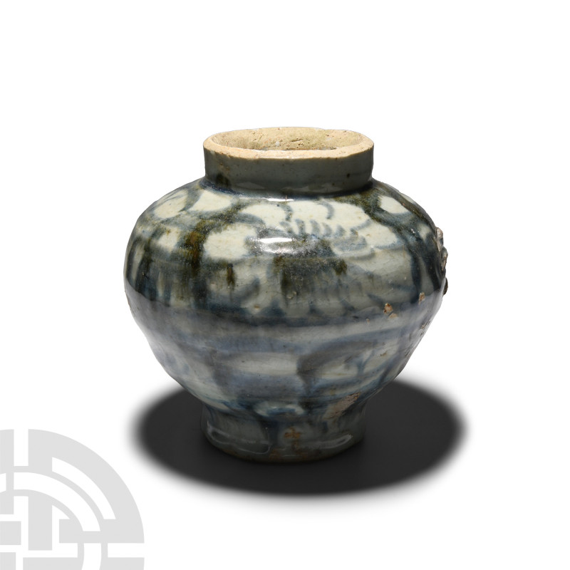 Chinese Blue and White Jar
15th-17th century A.D. Glazed with carinated profile...