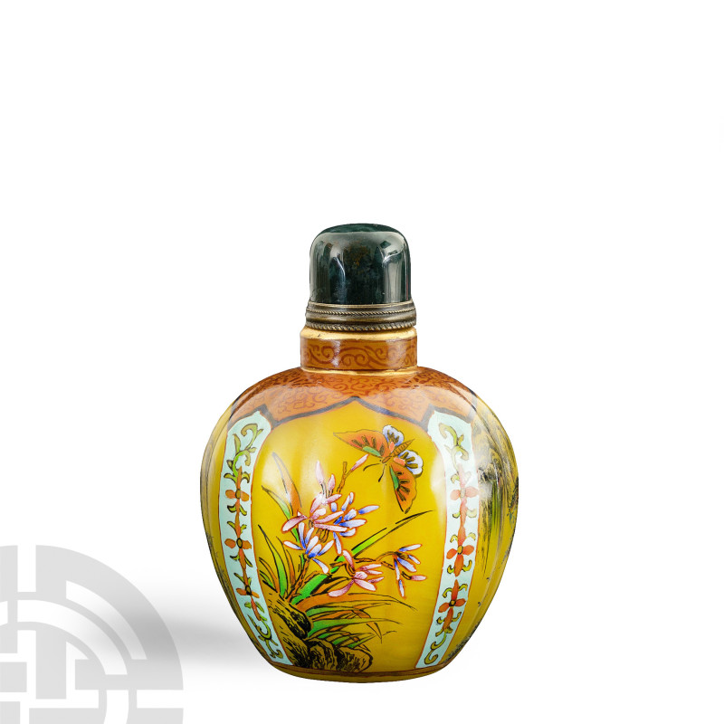 Chinese Glass Enamelled Four Scene Snuff Bottle
20th century A.D. Composed of a...