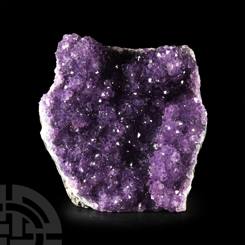 Natural History - Amethyst Crystal
Freestanding with cut base, cut to reveal de...