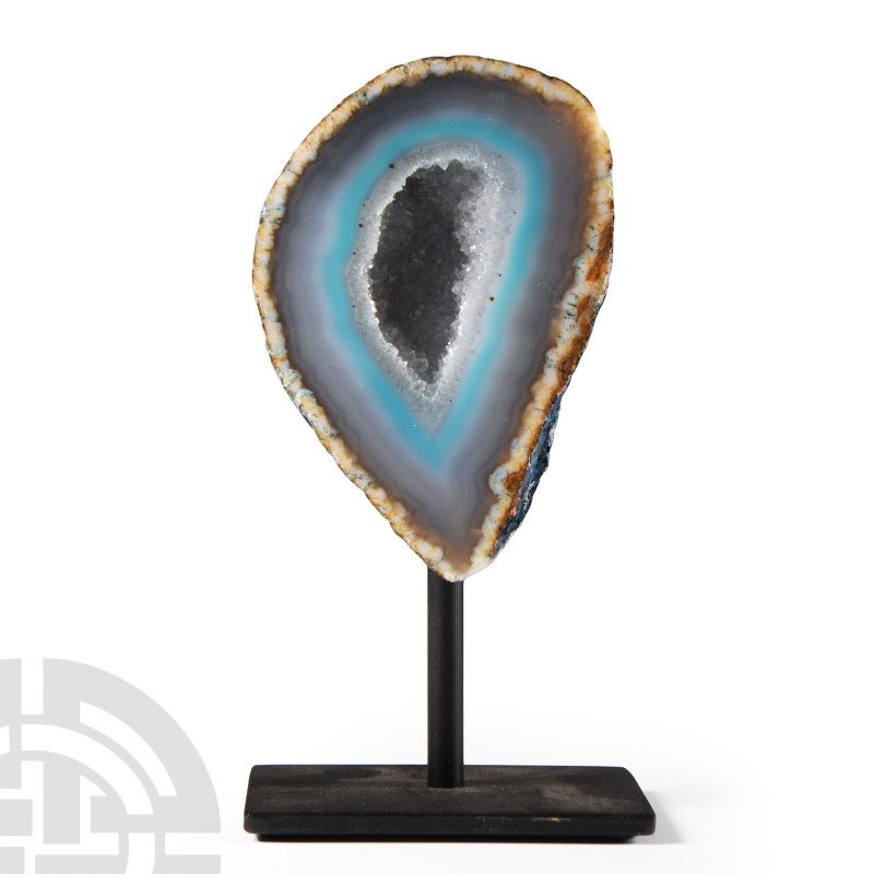 Natural History - Dyed Agate on Stand
The teardrop-shaped body cut and polished...