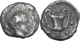 Greek Italy. Southern Apulia, Tarentum. AR Hemiobol, 380-325 BC. Obv. Female head right. Rev. Kantharos surrounded by pellets. HN Italy 923; HGC 1 868...