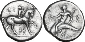 Greek Italy. Southern Apulia, Tarentum. AR Nomos, 280-272 BC. Obv. Horseman right, crowning horse; below, two amphorae. Rev. Phalanthos riding on dolp...