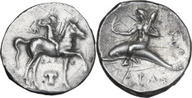 Greek Italy. Southern Apulia, Tarentum. AR Nomos, 280-272 BC. Obv. Horseman right, crowning himself; below, Ionic capital. Rev. Phalanthos riding on d...