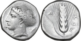 Greek Italy. Southern Lucania, Metapontum. AR Stater, 400-340 BC. Obv. Head of Demeter left, hair bound in sphendone. Rev. Ear of barely, leaf on left...