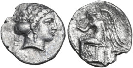Greek Italy. Bruttium, Terina. AR Triobol, c. 400-356 BC. Obv. Head of nymph right. Rev. Nike seated left, holding bird. HN Italy 2632. AR. 0.90 g. 12...