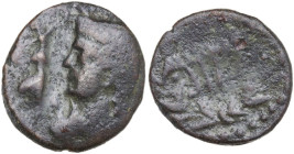 Sicily. Cossura. AE 18 mm. Struck c. 2nd century BC. Obv. Bust of Isis left, wearing klaft and hairdress in the shape of uraei on both sides of solar ...